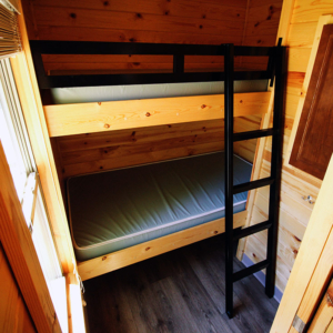 Bunk Bed room in our family friendly cottages in Muskoka at Santa's Whispering Pines Campground